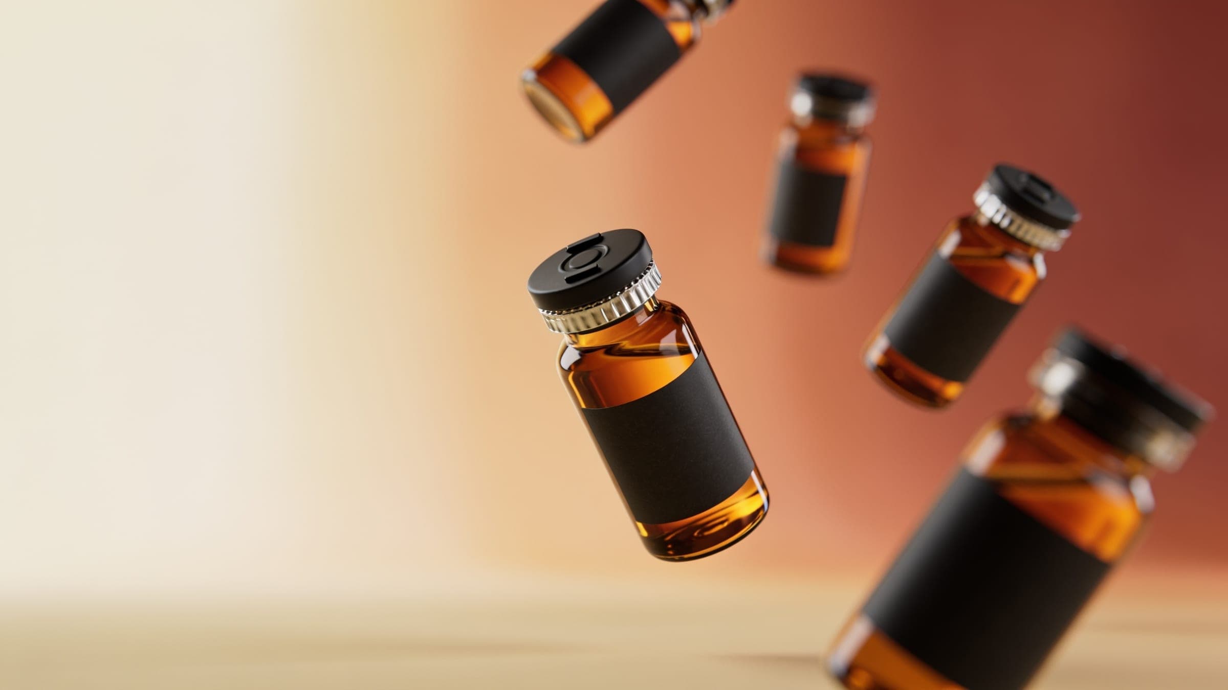 Amber Ascendtials vials floating against a warm gradient